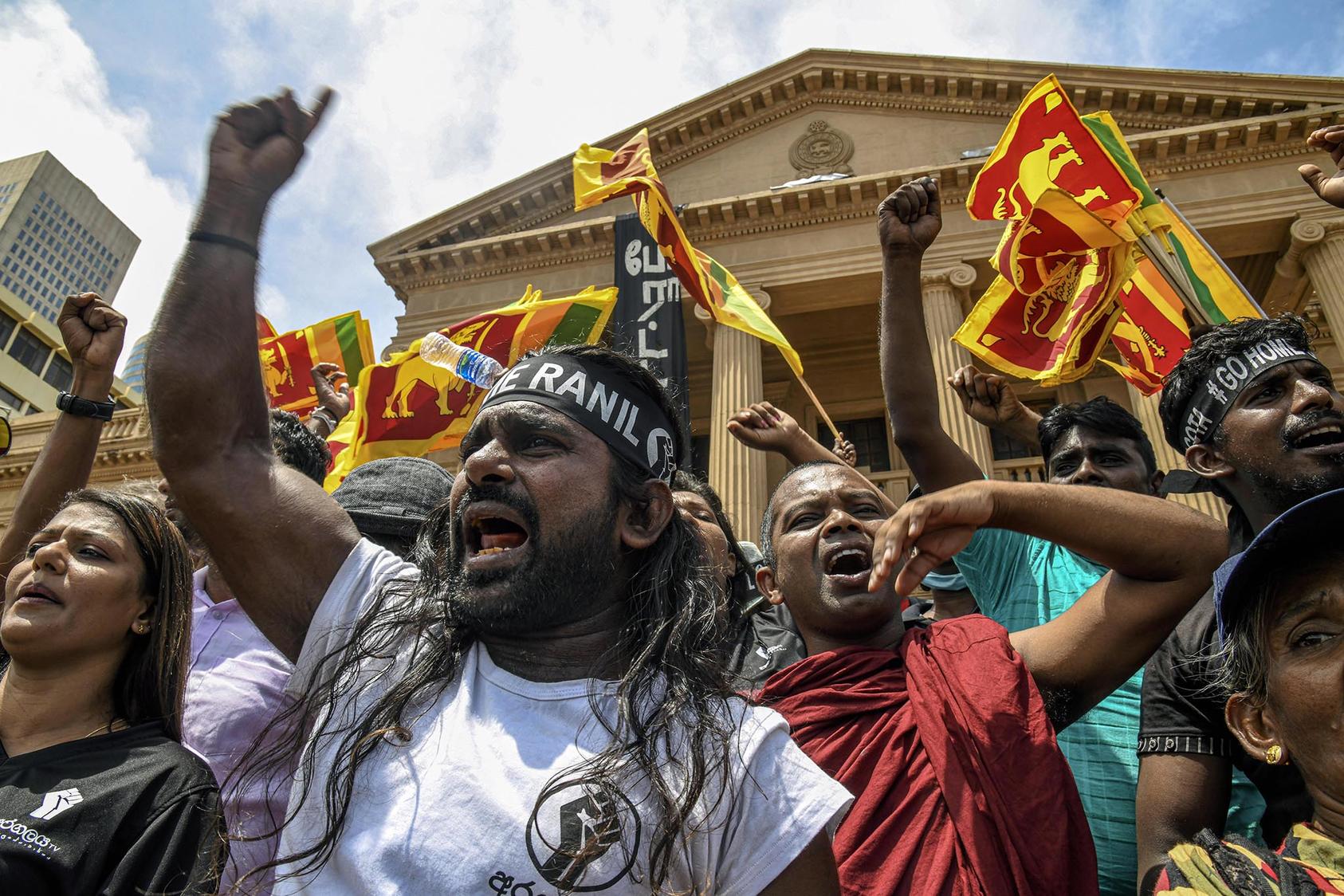 Protesters in Colombo, Sri Lanka, rally against Ranil Wickremesinghe after he was elected by lawmakers in Parliament as the new president on Wednesday, July 20, 2022. Wickremesinghe, a canny political survivor with ties to the exiled former president, inherits a nation in deep crisis. (Atul Loke/The New York Times)
