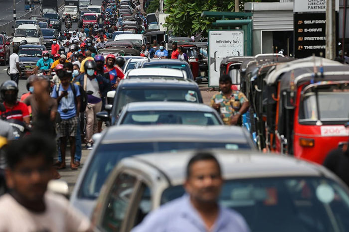 drivers are waiting to buy petrol at a petrol station in colombo sri lanka
